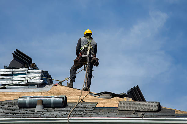 Professional Roof Replacement technician working in Mercedes, TX